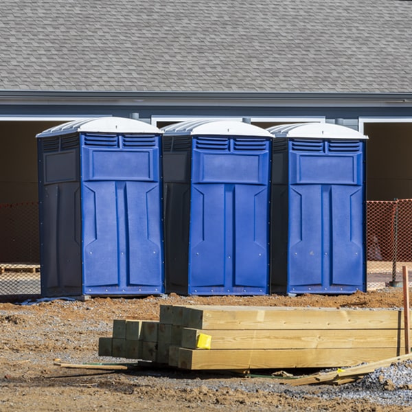 how often are the portable toilets cleaned and serviced during a rental period in Kykotsmovi Village